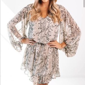 The Impeccable Pig Slithering Around Dress